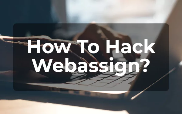 Two hands typing on laptop showing how to hack WebAssign